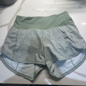 green lululemon shorts